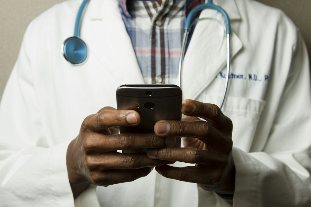 Dedicated healthcare professional consulting with patient